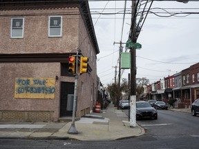 This Nov. 12, 2017, photo provided by Reveal shows Point Breeze neighborhood in Philadelphia. The Community Reinvestment Act of 1977 was designed to correct the damage of redlining, a now-illegal practice in which the government warned banks away from neighborhoods with high concentrations of immigrants and African Americans. The law didn't anticipate a day when historically black neighborhoods would be sought out by young white homebuyers.