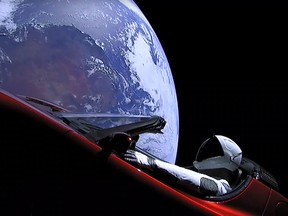 "Starman" sitting in SpaceX CEO Elon Musk's cherry red Tesla roadster after the Falcon Heavy rocket delivered it into orbit around the Earth on Tuesday.
