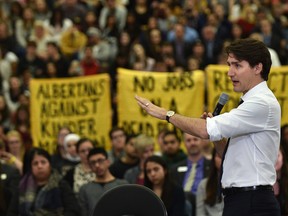 Prime Minister Justin Trudeau answers questions at his cross country town hall meeting at MacEwan University in Edmonton,  on Thursday.