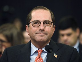 In this Feb. 14, 2018 photo, Health and Human Services Secretary Alex Azar attends a House Ways and Means Committee hearing on the FY19 budget on Capitol Hill in Washington. The Trump administration is clearing the way for a lower-cost alternative to comprehensive medical insurance plans sold under former President Barack Obama's health care law.
