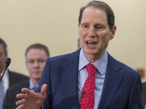 FILE - In this Jan. 10, 2018, file photo Sen. Ron Wyden, D-Ore., speaks at the Capitol in Washington. Some Medicare beneficiaries would face higher prescription drug costs under President Donald Trump's budget even as the sickest patients save money. That may make it harder to sell the complex plan to Congress in an election year.