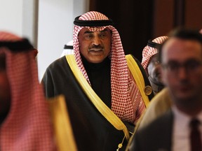 Kuwaiti Foreign Minister Sabah Khalid Al Sabah walks toward a news conference in Kuwait City, Kuwait, Tuesday, Feb. 13, 2018. Members of the U.S.-led coalition fighting against the Islamic State group met Tuesday at Kuwait's Bayan Palace as American officials are pressing their partners to refocus efforts, overcome rivalries and concentrate on the eradication from Iraq and Syria of the extremist group.