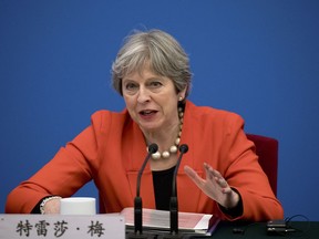 British Prime Minister Theresa May speaks during the inaugural meeting of the UK-China CEO Council at the Great Hall of the People in Beijing, Wednesday, Jan. 31, 2018.