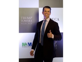 The eldest son of U.S. President Donald Trump, Donald Trump Jr. gives a thumbs up as he arrives for a meeting in New Delhi, India, Tuesday, Feb. 20, 2018. Trump Jr. has arrived in India to help sell luxury apartments and lavish attention on wealthy Indians who have already bought units in a string of Trump-branded developments.