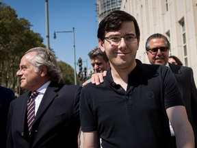 Lead defence attorney Benjamin Brafman walks with former pharmaceutical executive Martin Shkreli on August 4, 2017.