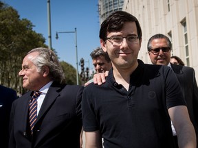 Lead defence attorney Benjamin Brafman walks with former pharmaceutical executive Martin Shkreli after the jury issued a verdict at the U.S. District Court for the Eastern District of New York, August 4, 2017.