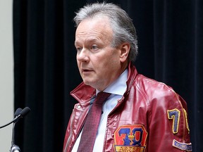 Stephen Poloz, Governor of the Bank of Canada, wears his 1978 Queen's Arts & Sciences jacket as he addresses about 225 Queen's faculty, staff, students and members of the public at the Smith School of Business on Tuesday, March 13, 2018.