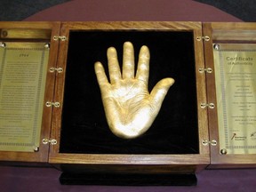 A solid gold cast of Nelson Mandela's hand.