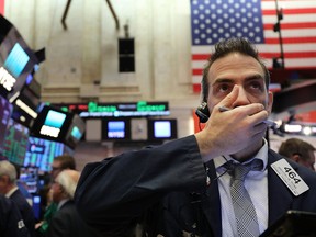 A trader on the floor of the New York Stock Exchange on Friday.