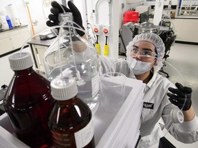 Lab technician Christina Navarro works in Canopy Growth Corp's Tweed facility in Smiths Falls, Ont.