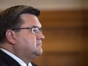 Outgoing Montreal mayor Denis Coderre listens to a question during a news conference in Montreal on Wednesday, November 8, 2017. Former Montreal mayor Denis Coderre has been hired as a special adviser by digital media company Stingray.