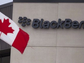 A Canadian flag flies at BlackBerry's headquarters in Waterloo, Ont., Tuesday, July 9, 2013. BlackBerry Ltd. says it's taking Facebook to court in the United States over an alleged infringement over its intellectual property.