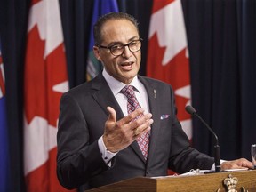 Alberta Finance Minister Joe Ceci speaks about the Government of Alberta's 2016-17 year-end financial results, in Edmonton on June 29, 2017. Opposition parties say Albertans should brace for a provincial budget with rosy revenue projections at the front end but more red ink at the back when the bills come due. Finance Minister Joe Ceci, who is to table the 2018 fiscal budget on Thursday, announced earlier this week that it will stick to the theme of avoiding deep cuts to front-line services while continuing to spend on operations and capital projects as Alberta works itself out of the oil-crash doldrums.