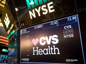 A monitor displays CVS Health Corp. signage on the floor of the New York Stock Exchange in New York on Dec. 4, 2017.