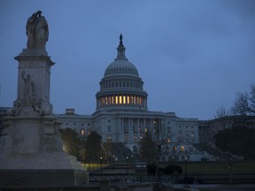 The Capitol is seen early Tuesday, March 20, 2018 in Washington.  Two major issues, the border wall and a tunnel and rail project, are holding up the massive government-wide spending bill that must pass Congress before a midnight Friday deadline to avoid another government shutdown.  An agreement could be announced as early as today.