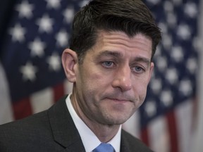 Speaker of the House Paul Ryan, R-Wis., meets with reporters following a closed-door Republican strategy session on Capitol Hill in Washington, Tuesday, March 20, 2018. Ryan says he's hoping bargainers can resolve the final disputes in a government-wide spending bill in time for Congress to begin voting Thursday on the measure.