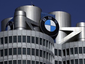 FILE - In this May 10, 2017 file photo the logo of German car manufacturer BMW visible at the headquarters in Munich, Germany. German prosecutors and police have searched offices at the Munich headquarters of automaker BMW on Tuesday, March 3, 2018 in connection with an investigation into suspected manipulation of diesel vehicle emissions.