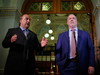 B.C. Green Party leader Andrew Weaver, left, and B.C. Premier John Horgan. Horgan supports the LNG Canada project, meanwhile Weaver, who provides the balance of power for Horgan’s NDP party, warns he could withdraw from the coalition if Horgan allows the project to go ahead.