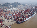 An container ship is docked at the Yangshan Deep Water Port in Shanghai, China