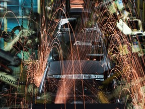 Robots weld Hyundai Motor Co. vehicle frames on the production line at the company's factory in Asan, South Korea.