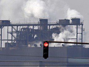 A light turned red in front of the Krupp Mannesmann steel factory in Duisburg, Germany, Friday, March 2, 2018. U.S. President Donald Trump risks sparking a trade war with his closest allies if he goes ahead with plans to impose steep tariffs on steel and aluminum imports, German officials and industry groups warned Friday.