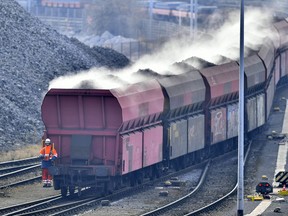 A train brings steaming coke to the Krupp Mannesmann steel factory in Duisburg, Germany, Friday, March 2, 2018. U.S. President Donald Trump risks sparking a trade war with his closest allies if he goes ahead with plans to impose steep tariffs on steel and aluminum imports, German officials and industry groups warned Friday.