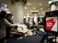 Shoppers look for deals at a Nordstrom store in downtown Toronto