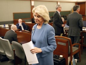 Elaine Wynn, ex-wife of Steve Wynn, leaves a hearing Wednesday, March 28, 2018, in Las Vegas. Elaine Wynn has accused her ex-husband and others of getting her off the company's board of directors in 2015 because of her inquiries into company activities. She has claimed that she was not re-nominated to be a board member that year as a result of retaliation.