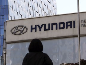 FILE - In this April 26, 2017, file photo, the logo of the Hyundai Motor Co. is displayed at the automaker's showroom in Seoul, South Korea.    Air bags in some Hyundai and Kia cars failed to inflate in crashes and four people are dead. Now the U.S. government's road safety agency wants to know why. The National Highway Traffic Safety Administration says it's investigating problems that affect an estimated 425,000 cars made by the Korean automakers. The agency also is looking into whether the same problem could happen in vehicles made by other companies.