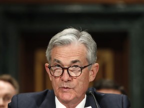 FILE - In this March 1, 2018, file photo, Federal Reserve Chairman Jerome Powell testifies as he gives the semiannual monetary policy report to the Senate Banking Committee on Capitol Hill in Washington. The Federal Reserve's first meeting under Powell's leadership will likely end Wednesday, March 21, with an announcement that the Fed will resume its modest interest rate hikes.