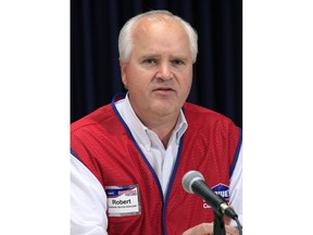 FILE- In this Nov. 8, 2012, file photo, Chairman and CEO of Lowe's Robert Niblock attends a news conference in New York. Niblock, who's worked for the home improvement retailer for 25 years, is retiring. Niblock will stay in his roles on an interim basis while Lowe's looks for a successor.