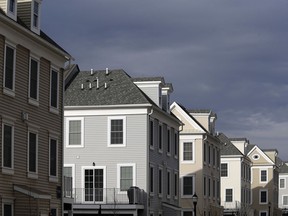 In this Feb. 26, 2018, photo new townhouses are seen in Wood-Ridge, N.J. On Thursday, March 22, Freddie Mac reports on the week's average U.S. mortgage rates.