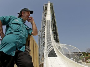 FILE - In this July 9, 2014, file photo, ride designer Jeffery Henry looks over his creation, the world's tallest waterslide called "Verruckt" at Schlitterbahn Waterpark in Kansas City, Kan. The Kansas City Star reports that Schlitterbahn Waterparks and Resorts co-owner Henry was arrested Monday, March 26, 2018, in Cameron County, Texas.