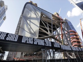 The Shed is shown in this March 6, 2018 photo, in New York. The building, in Manhattan's Hudson Yard's development, is a new arts space consisting of a stationary building with a a shell constructed around it that can move in a matter of minutes to cover the adjacent public plaza and create an additional 120-foot-high giant room.