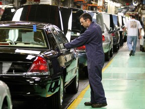 Factory employees work on Ford Crown Victoria vehicles on Thursday, September 8, 2011 at the Ford Assembly Plant in St. Thomas, Ont.The Canadian economy appears to be gathering steam, to the surprise of many, with better-than-expected growth rates in the first two months of the year that have many analysts revising their miserly forecasts for the year. THE CANADIAN PRESS/Dave Chidley