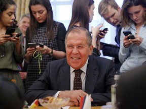 Russian Foreign Minister Sergey Lavrov smiles during a meeting with South Korean head of National Security Chung Eui-yong at the Russian foreign ministry in Moscow,Tuesday March 13, 2018. Russia will only cooperate with Britain on the investigation into last week's poisoning of an ex-Russian spy Sergei Skripal and his daughter Yulia if it receives samples of the nerve agent that is believed to have been used, Russia's foreign minister Lavrov said Tuesday.