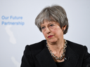 Britain's Prime Minister Theresa May listens to a question after giving a speech on Brexit, March 2, 2018. 