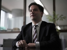 In this March 15, 2018 photo, Mark Karpeles, the former CEO of Japan-based bitcoin exchange Mt. Gox speaks during an interview in Tokyo. Four years after popular Tokyo-based bitcoin exchange Mt. Gox was hacked and went bankrupt, the case still casts a shadow over the regulatory regime put in place to protect Japan's thriving cryptocurrency market. The former CEO of Mt. Gox, facing a criminal trial in Japan, hopes the remaining bitcoins can be used to pay back losses from the heist at the lost bitcoins' current value.