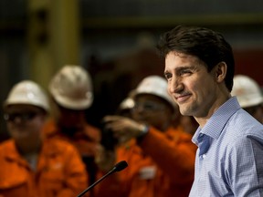 Prime Minister Justin Trudeau speaks to reporters following a tour of Dofasco in Hamilton Ont., Tuesday.