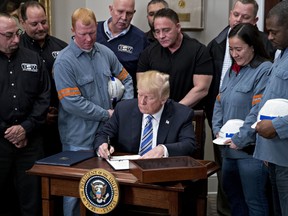 U.S. President Donald Trump signed the order over steel and aluminum tariffs on March 8.