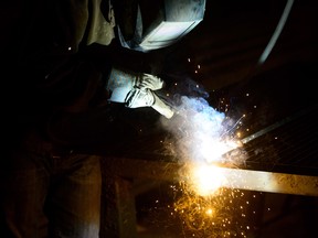 A welder fabricates a steel structure in Ottawa. Meanwhile, House Speaker Paul Ryan is raising concerns that U.S. President Donald Trump's plan to impose new tariffs on steel and aluminum imports could start a trade war.