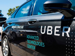 Pilot models of the Uber self-driving car are displayed at the Uber Advanced Technologies Center in Pittsburgh, Pennsylvania.