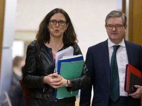 European Commissioner for Trade Cecilia Malmstroem, left, arrives for a meeting of the College of the European Commission at EU headquarters in Brussels on Wednesday, March 7, 2018. The European Union will set out its strategy Wednesday on how to counter potential U.S. punitive tariffs on steel and aluminum.
