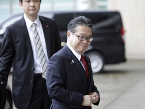Japanese Minister for Economy, Trade and Industry Hiroshige Seko arrives for a meeting at EU headquarters in Brussels on Saturday, March 10, 2018. The European Union is seeking clarity from Washington about whether the 28-nation bloc will be exempt from President Donald Trump's steel and aluminum tariffs.