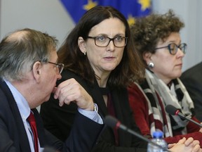 European Commissioner for Trade Cecilia Malmstroem, center, meets with Japanese Minister for Economy, Trade and Industry Hiroshige Seko and U.S. Trade Representative Robert Lighthizer at EU headquarters in Brussels on Saturday, March 10, 2018. The EU is still seeking clarity from Washington about whether the 28-nation bloc will be exempt from U.S. President Donald Trump's steel and aluminum tariffs.