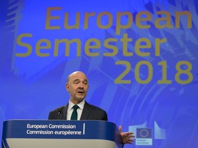 European Commissioner for Economic and Financial Affairs Pierre Moscovici speaks during a media conference at EU headquarters in Brussels on Wednesday, March 7, 2018. The European Commission on Wednesday published its annual analysis of the economic and social situation in the Member States, including progress in implementing country-specific recommendations and an assessment of possible imbalances.