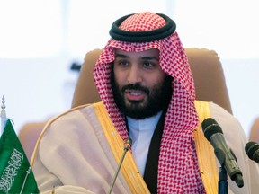 FILE - In this Nov. 26, 2017, file photo released by the state-run Saudi Press Agency, Saudi Crown Prince Mohammed bin Salman speaks in Riyadh, Saudi Arabia. Saudi Arabia's young crown prince is opening a marathon tour of the United States with a first stop in Washington, where he plans to meet March 20 with President Donald Trump. The visit comes as the United States and much of the West are still trying to figure out Crown Prince Mohammed bin Salman, whose sweeping program of social changes at home and increased Saudi assertiveness abroad has upended decades of traditional rule in Saudi Arabia.(Saudi Press Agency via AP, File)