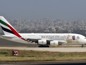 A double-decker Airbus A380 plane lands at the Rafik Hariri International Airport in Beirut, Lebanon, Thursday, March. 29, 2018. An Emirates Airline superjumbo jet has landed at Beirut's international airport as Lebanon looks to sustain a revival of its tourism industry. It is the first revenue A380 flight to the country.