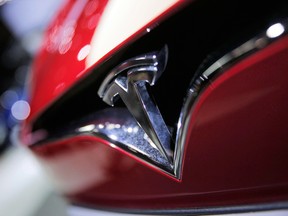 Tesla has sought to play down Wall Street speculation that it would need to return to capital markets this year to raise more funds as it ramps up production of the Model 3.