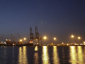 This photo taken Tuesday March 13, 2018 shows a night view of  the port of Djibouti. Djibouti, an arid Horn of Africa nation with less than 1 million inhabitants, has become a military outpost for China, France, Italy and Japan, with that nation's first overseas base since World War II.